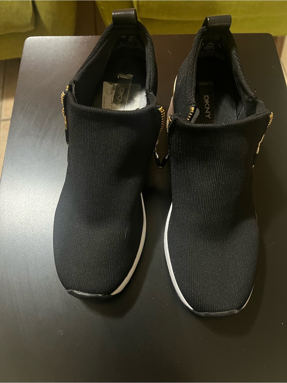 DKNY Black Knit Slip-On Sneakers with Gold Zipper Detail